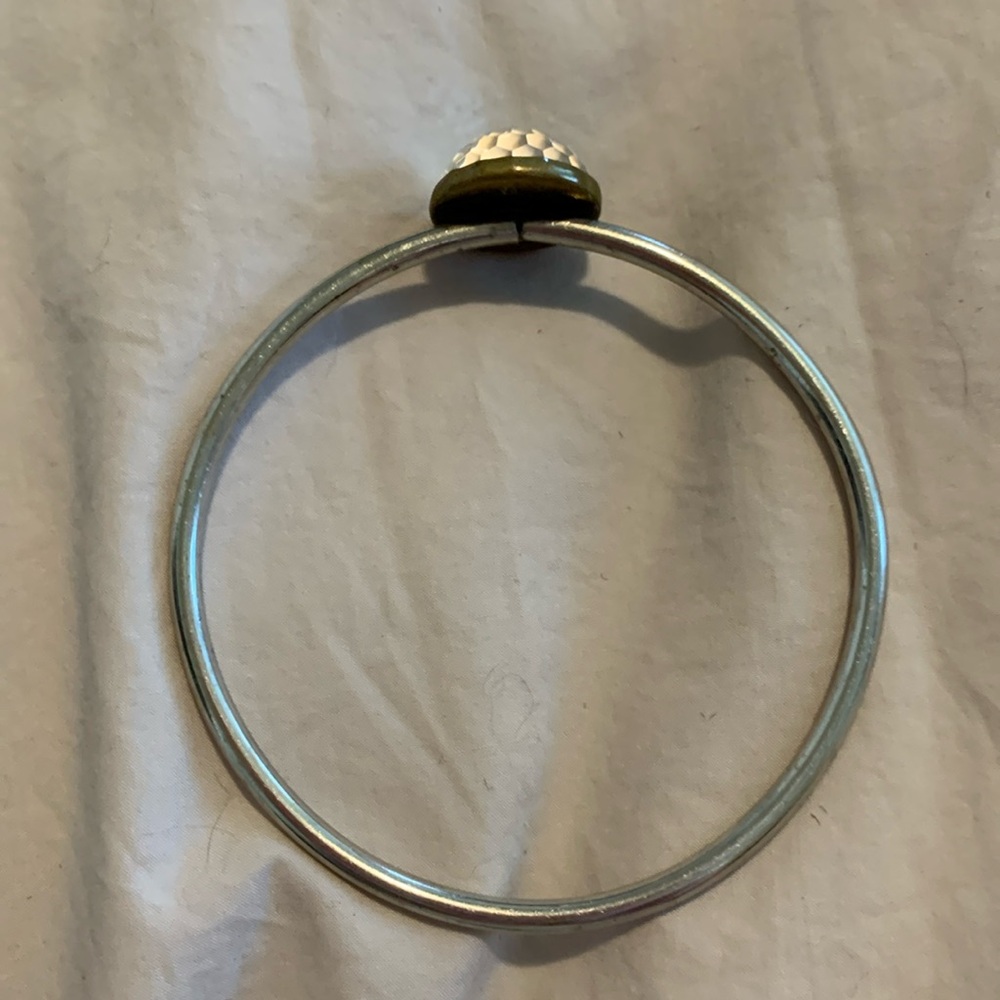 Vintage metal bracelet with crystal top.